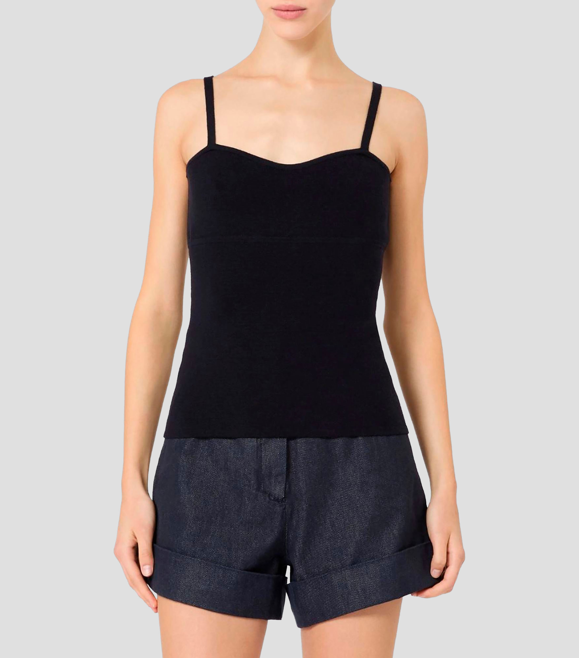 Blusa lisa sin mangas Mujer